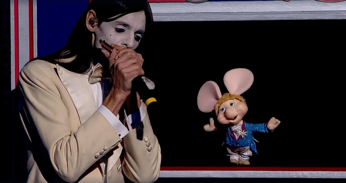 Una voce inaspettata | Scopri chi si cela dietro Topo Gigio a Sanremo 2025! -