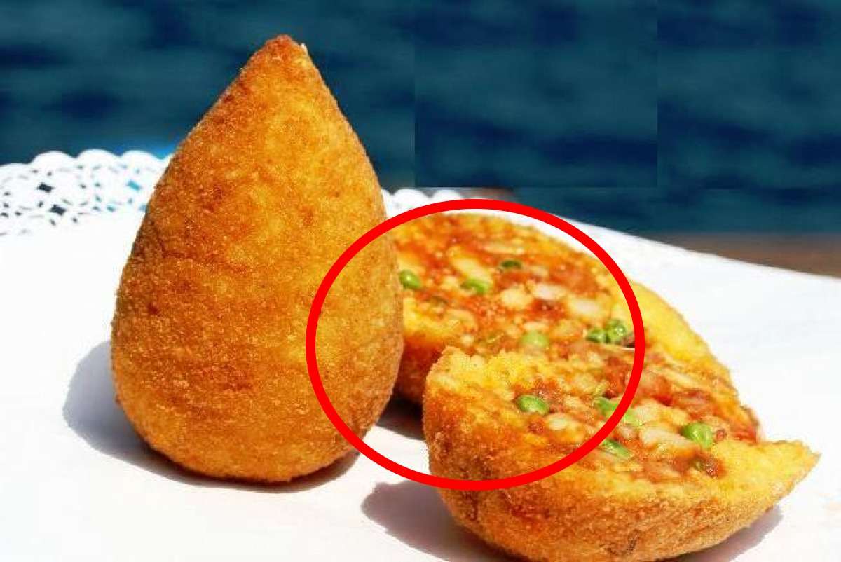 Non immagineresti mai cosa c’è dentro | L’arancino di Catania e il segreto che sorprende tutti -