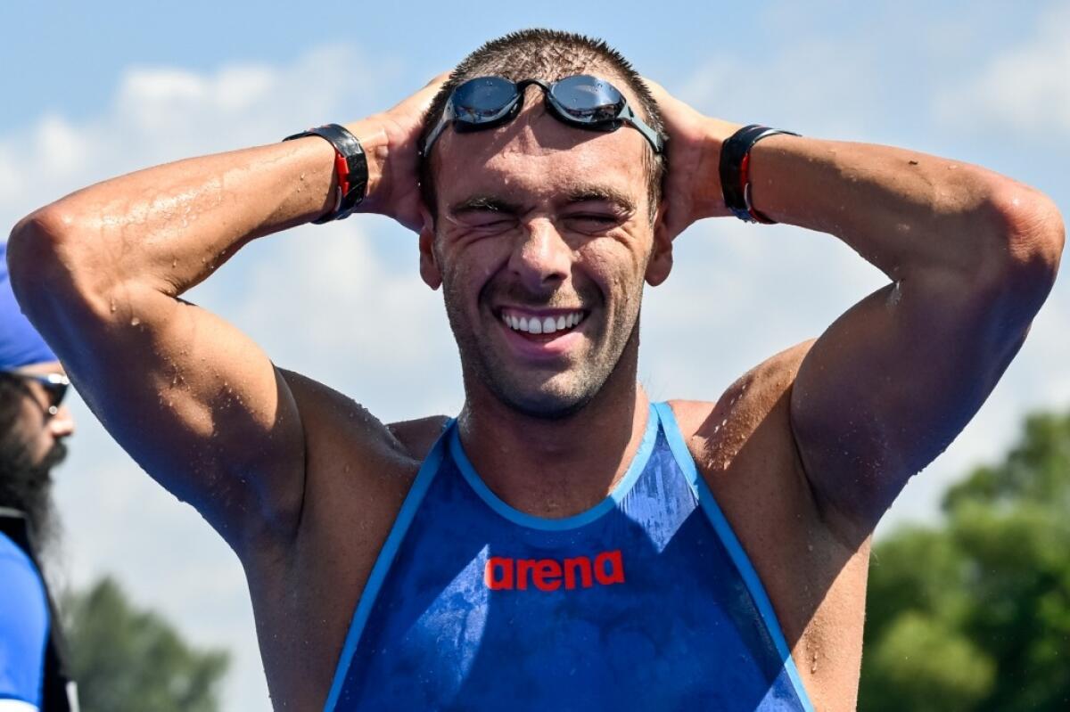 Paltrinieri conquista l’argento con il dito rotto | La vera determinazione che sfida ogni limite! -