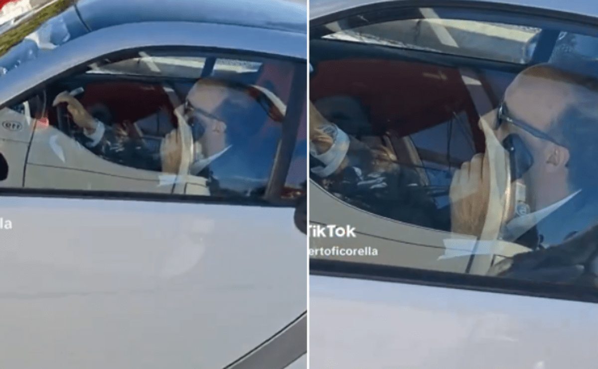 Al volante senza cintura e al telefono, bufera social su Roberto Benigni - 
