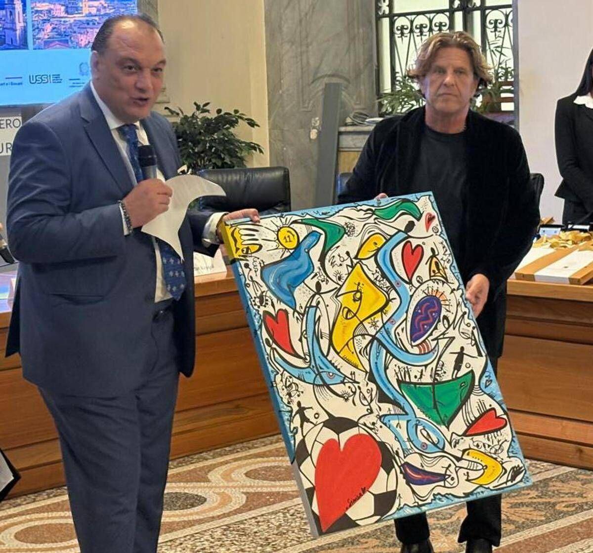 Mihajlović nel 'cuore' di tutti, premio alla memoria e opera d'arte di Benito Macerata - 